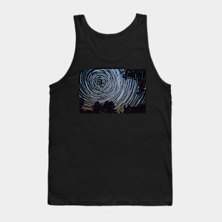 Starry night sky, startrails between trees landscape Tank Top